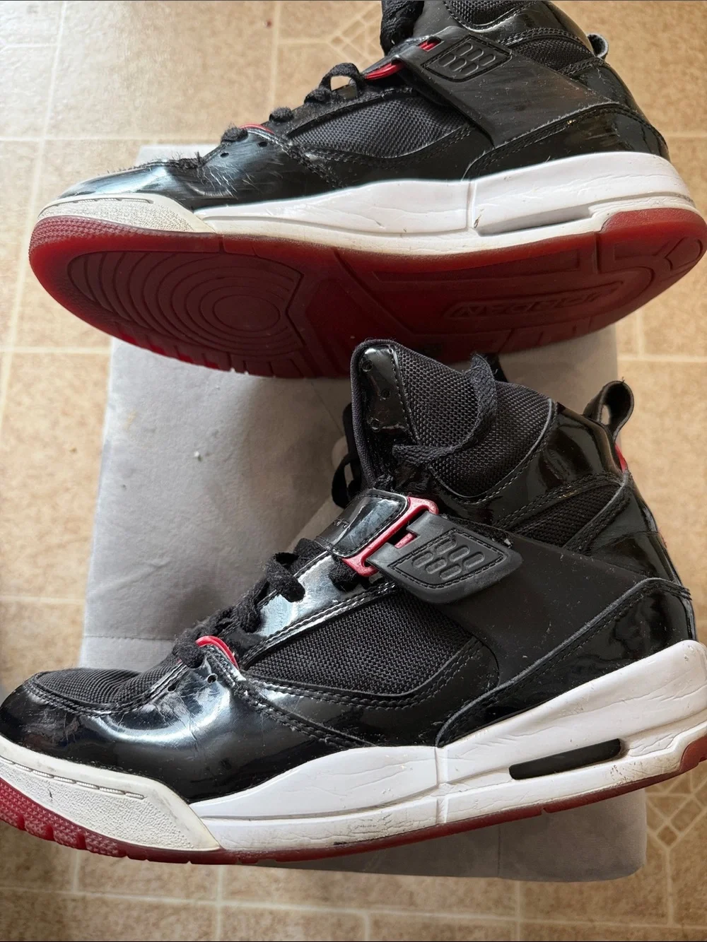Jordan Black High-Top Sneakers with Red Highlights